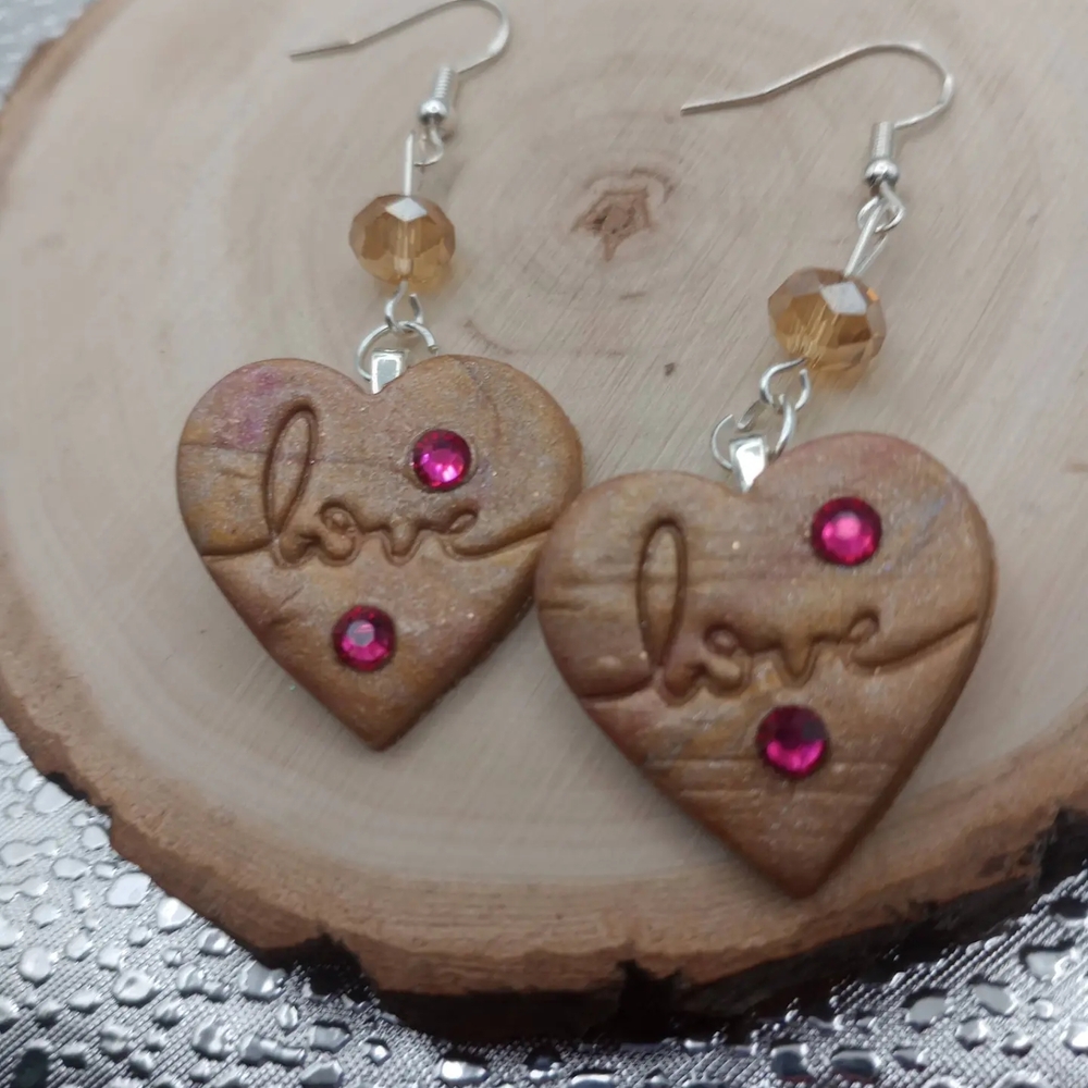 Heart-Shaped Brown Earrings with Pink Accents